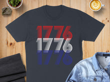 Load image into Gallery viewer, Dark t-shirt with "1776" in red, white, and blue stripes.