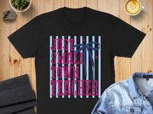 Load image into Gallery viewer, Black t-shirt with "Just a Small Town Teacher" text and blue bow.