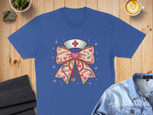 Load image into Gallery viewer, Blue t-shirt with a pink bow graphic featuring hearts, stethoscope, and medical cross.
