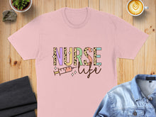Load image into Gallery viewer, Nurse life text with a syringe and coffee on a pink t-shirt.