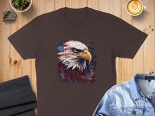 Load image into Gallery viewer, Brown t-shirt with a detailed eagle head graphic against an American flag background.