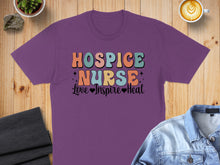 Load image into Gallery viewer, Purple t-shirt with "Hospice Nurse Love Inspire Heal" text.