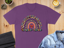 Load image into Gallery viewer, Purple t-shirt with rainbow, leopard print, and "Hospice Nurse" text.