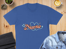 Load image into Gallery viewer, Blue t-shirt with pink "Nurse" text and stethoscope heart design.