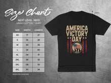 Load image into Gallery viewer, Next Level 3600 size chart with t-shirt showing "America Victory Day" graphic.
