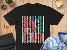 Load image into Gallery viewer, Black t-shirt with "IT'S A GOOD DAY TO TEACH" text and decorative ribbon.