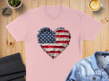 Load image into Gallery viewer, Pink t-shirt with distressed American flag heart graphic, denim jacket, and coffee.