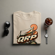 Load image into Gallery viewer, Cream t-shirt with "QRP" text and racing graphic.