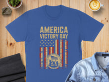Load image into Gallery viewer, Blue t-shirt with "America Victory Day May 08" text and American flag design.