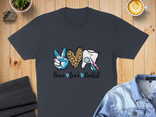 Load image into Gallery viewer, T-shirt with peace sign, leopard heart, and tooth with dental tools, "Peace Love Dental" text.