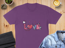 Load image into Gallery viewer, Purple t-shirt with stethoscope forming "love," syringe, and heart design.
