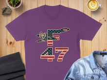 Load image into Gallery viewer, Purple t-shirt with an American flag airplane and the number 47.