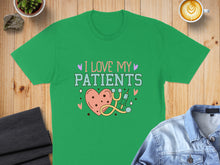 Load image into Gallery viewer, Green t-shirt with heart, stethoscope, and "I love my patients" text.