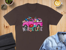 Load image into Gallery viewer, Brown t-shirt with pink truck graphic and "Nurse Life" text.