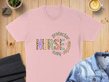 Load image into Gallery viewer, Pink t-shirt with "Nurse Protector Warrior Hero" text in colorful, patterned letters.