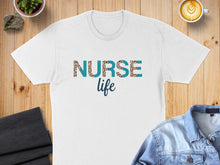Load image into Gallery viewer, White t-shirt with "Nurse life" text in leopard print and blue font.