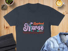 Load image into Gallery viewer, Registered Nurse text with stethoscope and syringes on a dark t-shirt.