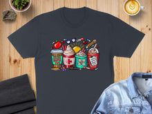Load image into Gallery viewer, Dark t-shirt with colorful "School Nurse Fuel" graphic of coffee, bandages, and school supplies.