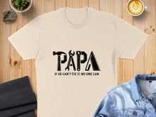 Load image into Gallery viewer, Cream t-shirt with "PAPA" in tool graphics and text "IF HE CAN'T FIX IT, NO ONE CAN."