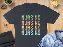 Load image into Gallery viewer, NURSING repeated in colored text on a dark t-shirt mockup.