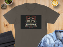 Load image into Gallery viewer, Dark grey t-shirt with "EST. 1776 Independence Day" design and US flags.
