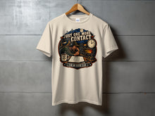 Load image into Gallery viewer, T-shirt graphic with man using radio, "Just One More Contact" and "2:00 AM Radio Club" text.