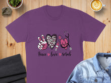 Load image into Gallery viewer, Purple t-shirt with "Peace love scrub" text, hearts, and stethoscope graphic.