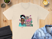 Load image into Gallery viewer, T-shirt with a nurse graphic and the text "You RN Good Hands".