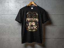 Load image into Gallery viewer, Black t-shirt with "99 Problems But SWR Ain't One" graphic featuring cables and a meter.