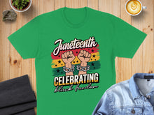 Load image into Gallery viewer, Green t-shirt with "Juneteenth Celebrating Black Freedom" text and chain graphic.