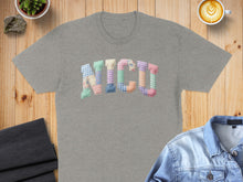 Load image into Gallery viewer, Grey t-shirt with "NICU" spelled out in a colorful patchwork fabric applique.