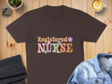 Load image into Gallery viewer, Brown t-shirt with "Registered Nurse" in retro, colorful lettering.