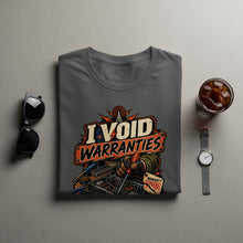 Load image into Gallery viewer, Grey t-shirt graphic with text "I VOID WARRANTIES" and electronics repair illustration.