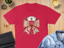 Load image into Gallery viewer, Red t-shirt with a pink bow, stethoscope, and "XOXO" text.