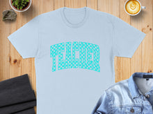 Load image into Gallery viewer, Light blue t-shirt with checkered "TEACHER" graphic.