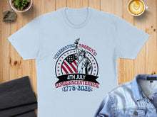 Load image into Gallery viewer, Light blue t-shirt with Statue of Liberty and "Celebrating America's 4th July Semiquincentennial 1776-2026" text.