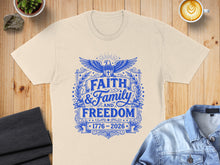 Load image into Gallery viewer, Cream t-shirt with "Faith & Family and Freedom 1776-2026" in blue graphic.