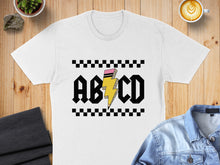 Load image into Gallery viewer, White t-shirt with black and yellow lightning bolt and "ABCD" text.