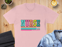 Load image into Gallery viewer, Pink t-shirt with "NURSE" in colorful block letters and "STRONG LOYAL CARING COMPASSIONATE" text.