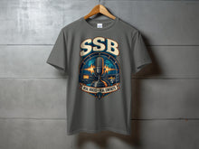 Load image into Gallery viewer, Grey t-shirt with SSB design featuring a globe, microphone, and radio equipment.