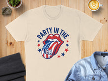 Load image into Gallery viewer, Cream t-shirt with "Party in the USA" text and an American flag tongue graphic.