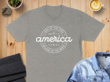 Load image into Gallery viewer, Grey t-shirt with "America Land of the Free Since 1776 Because of the Brave" text.