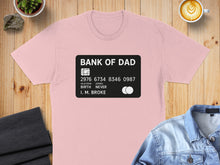 Load image into Gallery viewer, Bank of Dad credit card design on a pink t-shirt.