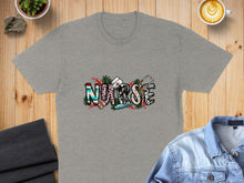 Load image into Gallery viewer, Grey t-shirt with "NURSE" text featuring medical symbols and floral elements.