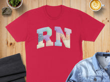Load image into Gallery viewer, Red t-shirt with "RN" stitched in a patchwork quilt design.