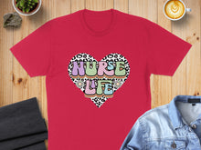 Load image into Gallery viewer, Red t-shirt with a colorful heart graphic that says "Nurse Life".