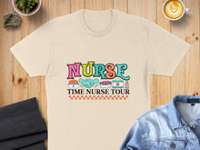 Load image into Gallery viewer, Cream t-shirt with "Nurse Time Nurse Tour" text and medical icons.