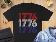 Load image into Gallery viewer, Black t-shirt with "1776" printed in red, white, and blue stripes.