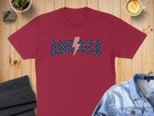 Load image into Gallery viewer, Maroon t-shirt with "AMERICA" graphic in red, white, and blue stars and lightning bolt.
