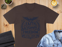 Load image into Gallery viewer, Brown t-shirt with navy blue "Faith &amp; Family Freedom" graphic and dates 1776-2026.
